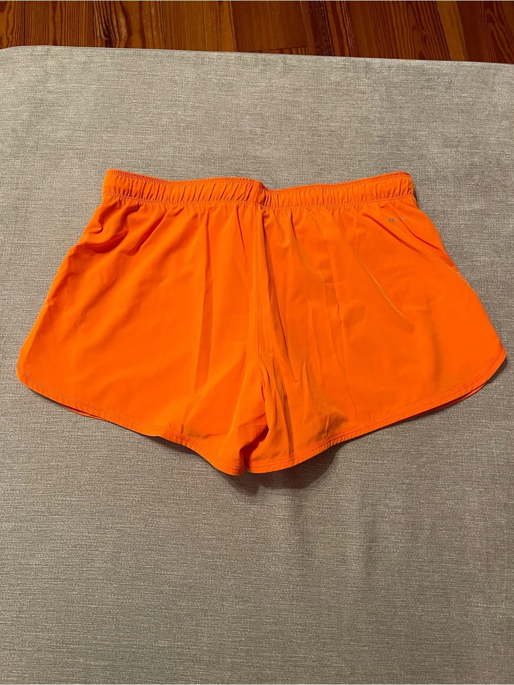 Nike Dri-FIT Women's Bright Orange Running Athletic Shorts with Pink Swoosh